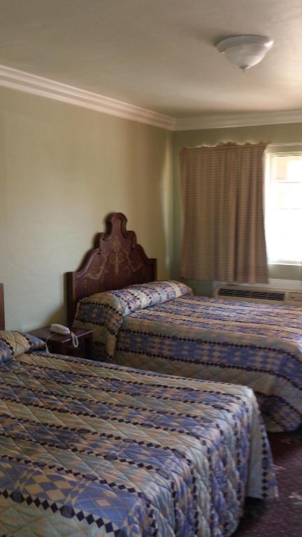 Santa Ana Travel Inn Quarto foto